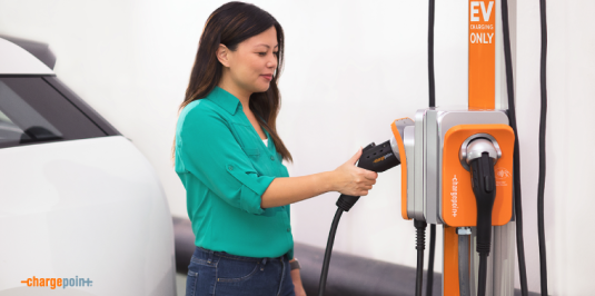 Person charging their car using ChargePoint CPF50
